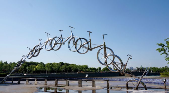 Park stainless steel abstract bike sculpture